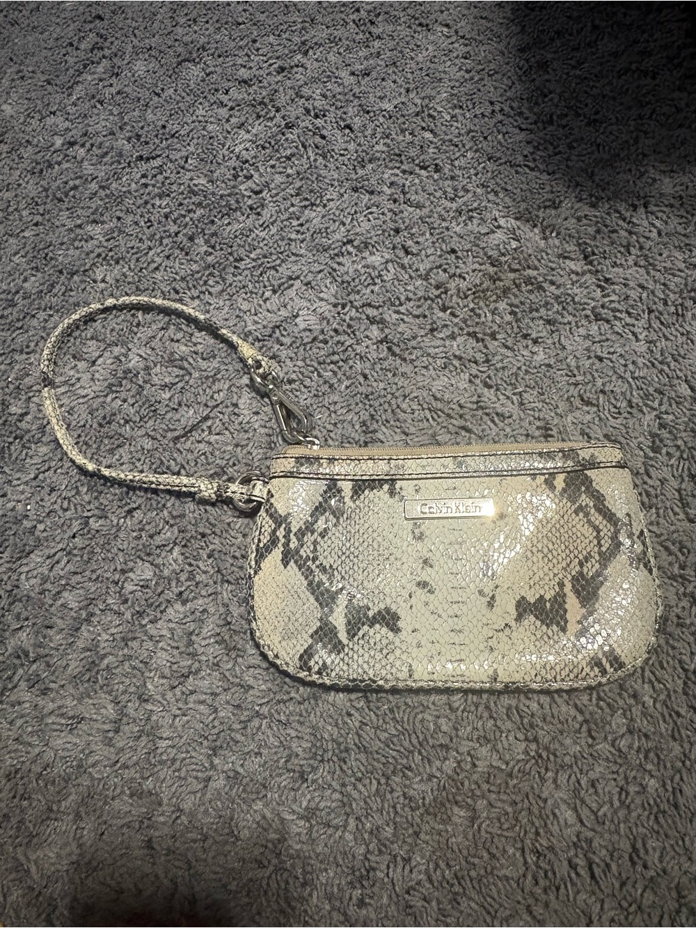 Light Used Calvin Klein snakeskin designed wristlet